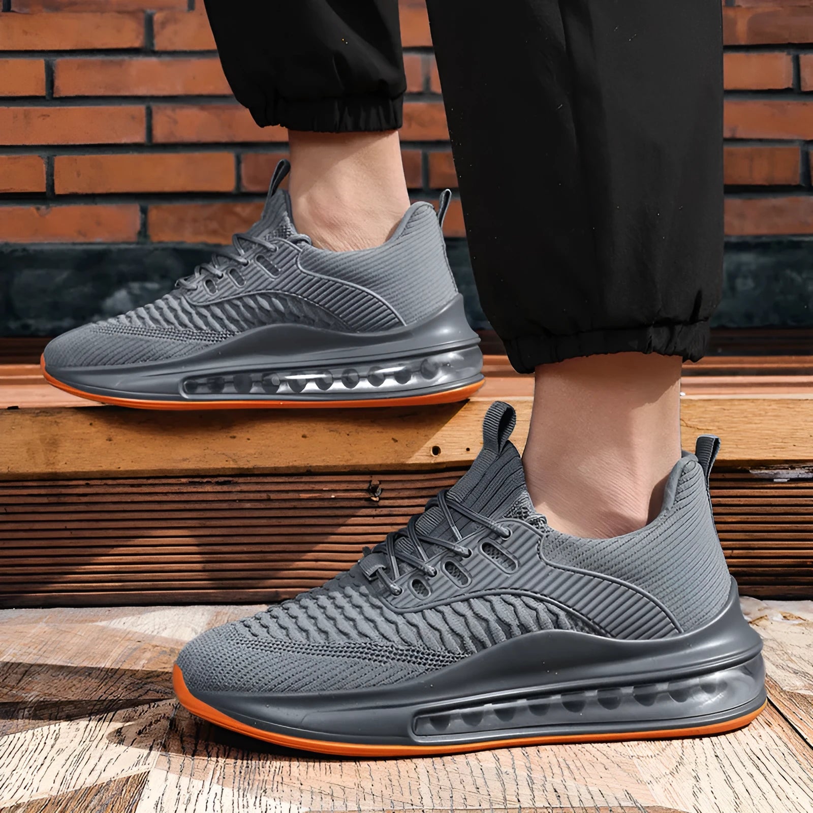Men's black mesh running shoes with platform sole and round toe design on white background
