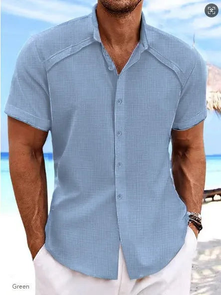 Hawaiian casual short sleeve solid colour shirt in a cotton blend fabric on a hanger.