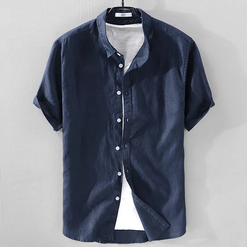 Men's loose fit short sleeve linen shirt in apricot colour on a hanger