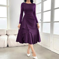 Purple women's long sleeve dress with ruffle detail and a mid waist fit.