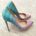 Ladies pointed toe patent leather heels with a pink to blue gradient colour and a high thin heel.