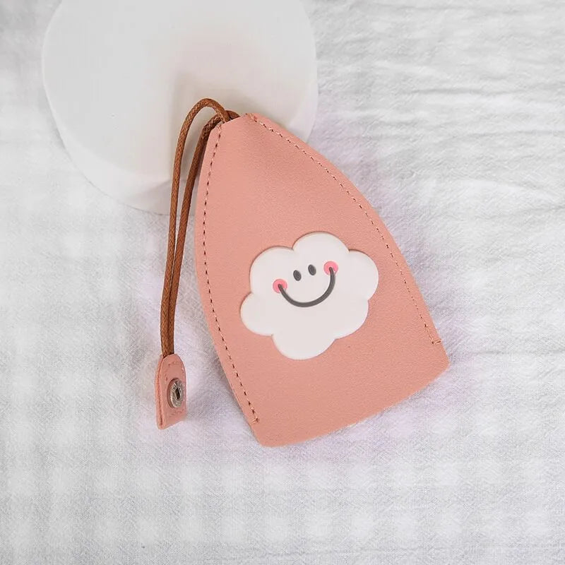 Cartoon pull-out key case in PU leather showing design options including resin fruit and big cartoon animal prints.