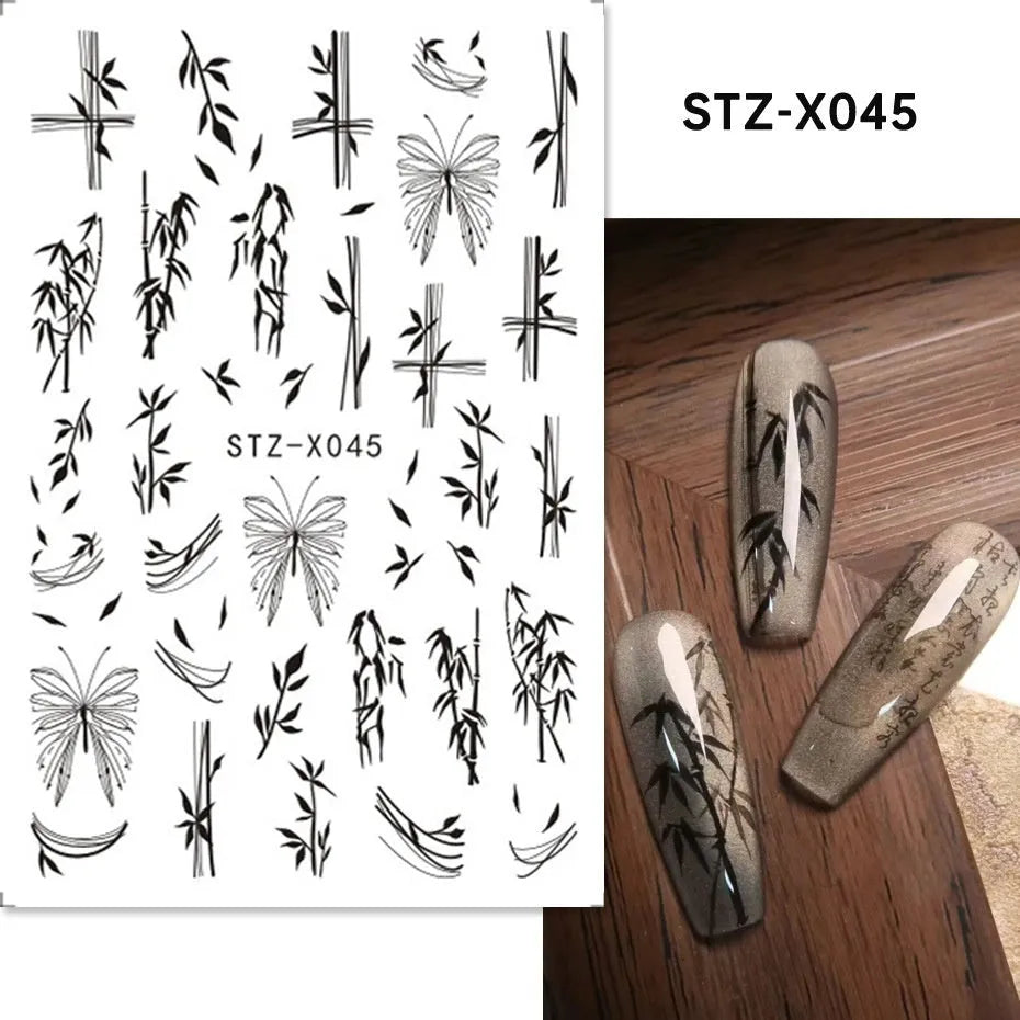 Plastic sheet of black, silver, and cartoon design nail art stickers for DIY manicures.