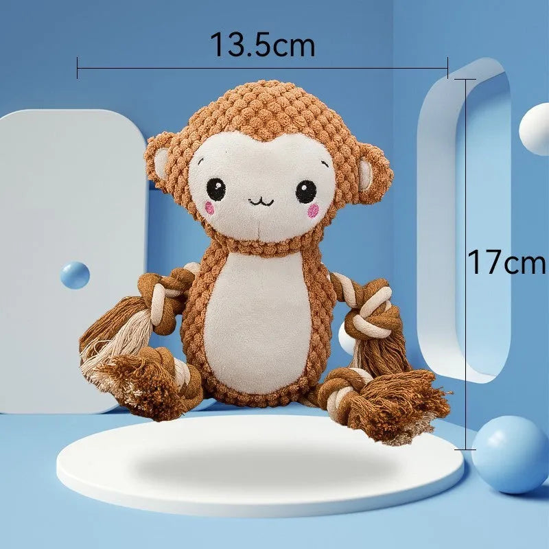 Lion and monkey plush squeaky dog toys side by side showing size difference