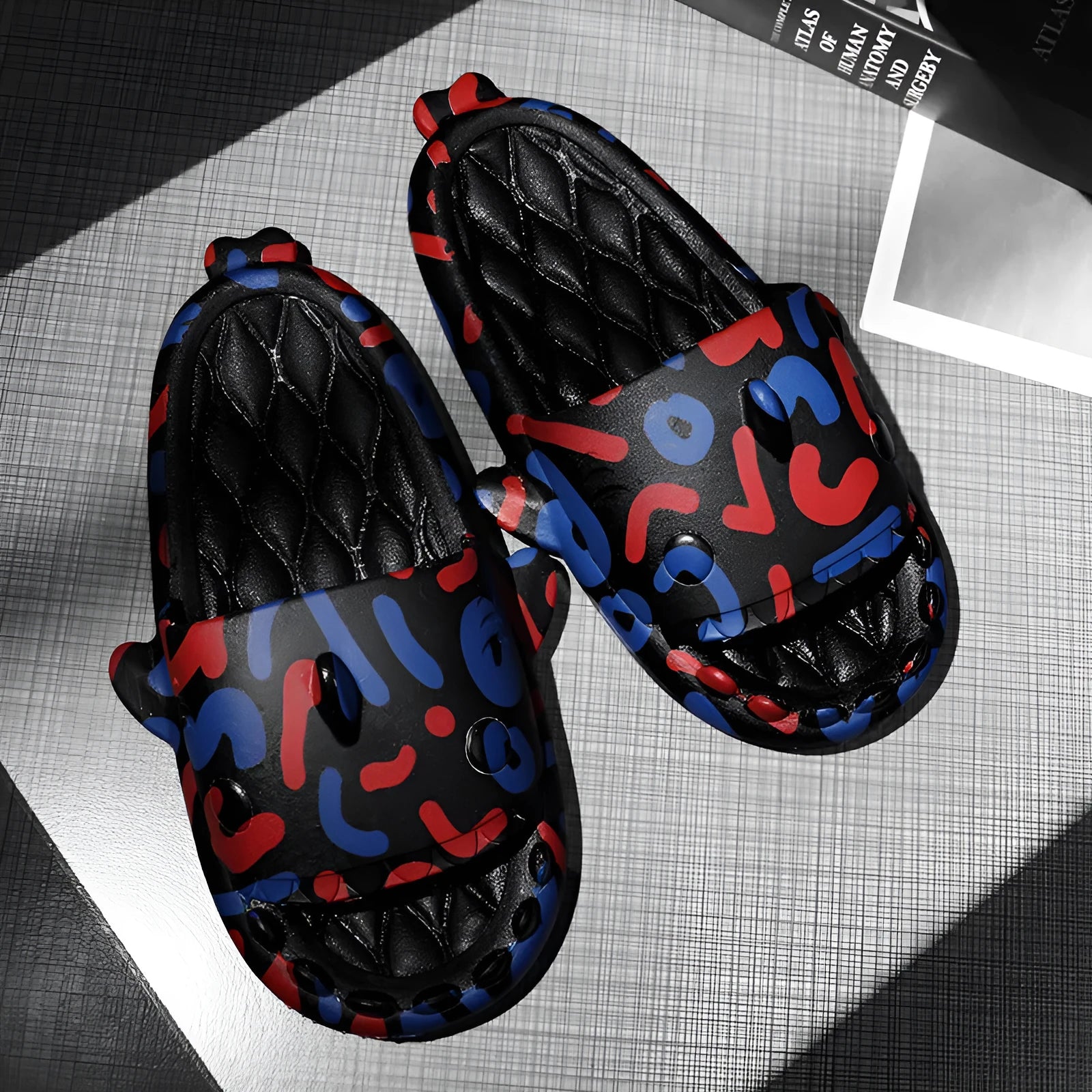 Shark design open-toe EVA home slippers for couples in beige, shown in a large size.