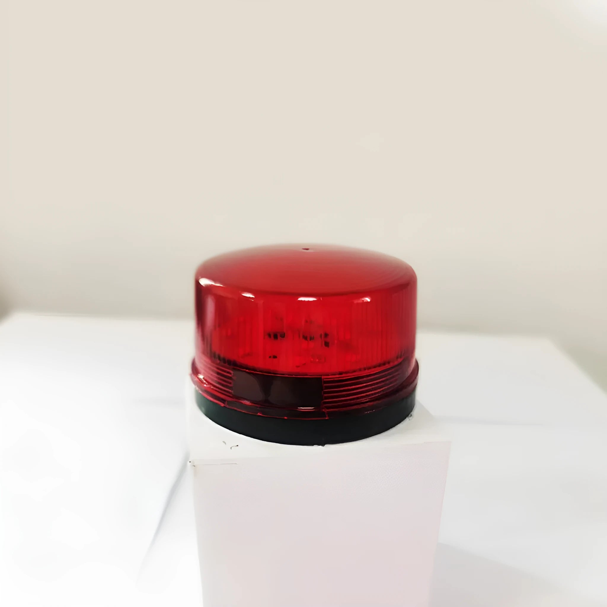 Ji'an Electronics HC-79 24V red warning light with integrated sounder, showing mounting base.
