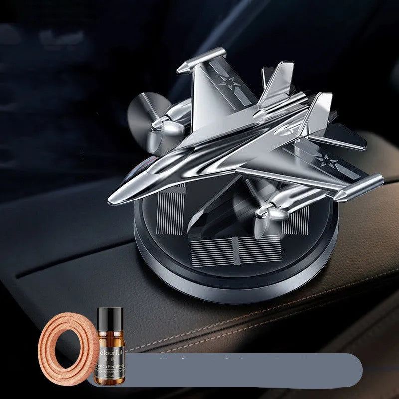 Solar powered rotating fighter aircraft perfume ornament in metallic finish with essential oil diffuser