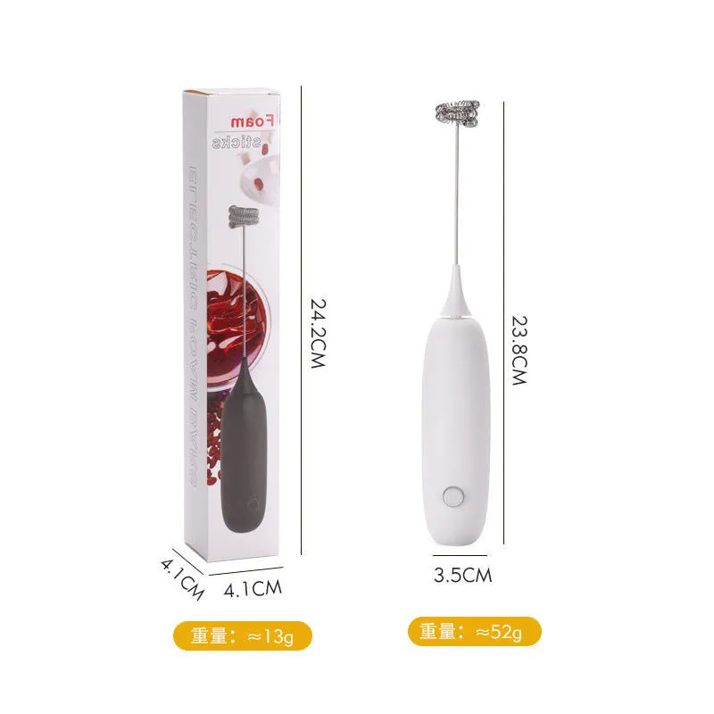 A hand-held electric milk frother in black and white colour options on a kitchen counter.