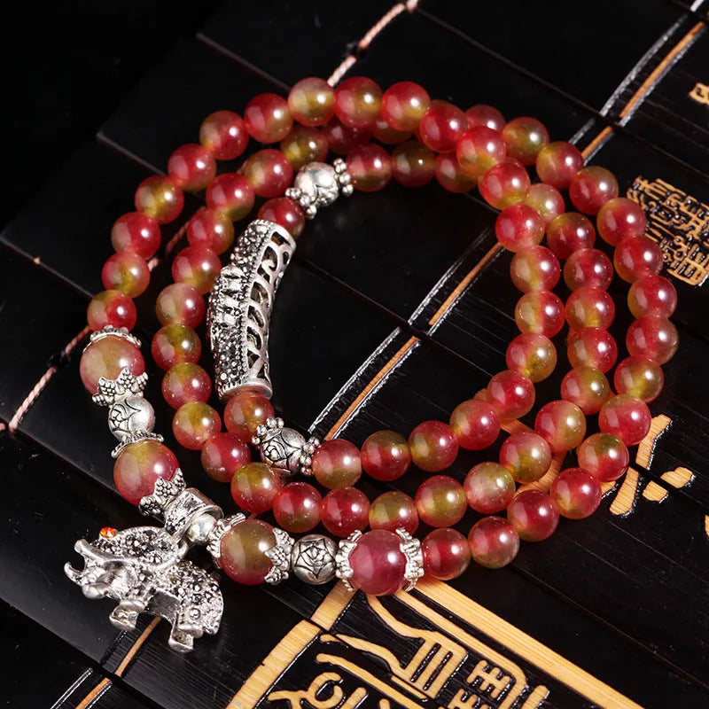 Watermelon crystal bracelet with Chinese knot fastening in 6mm or 8mm style options