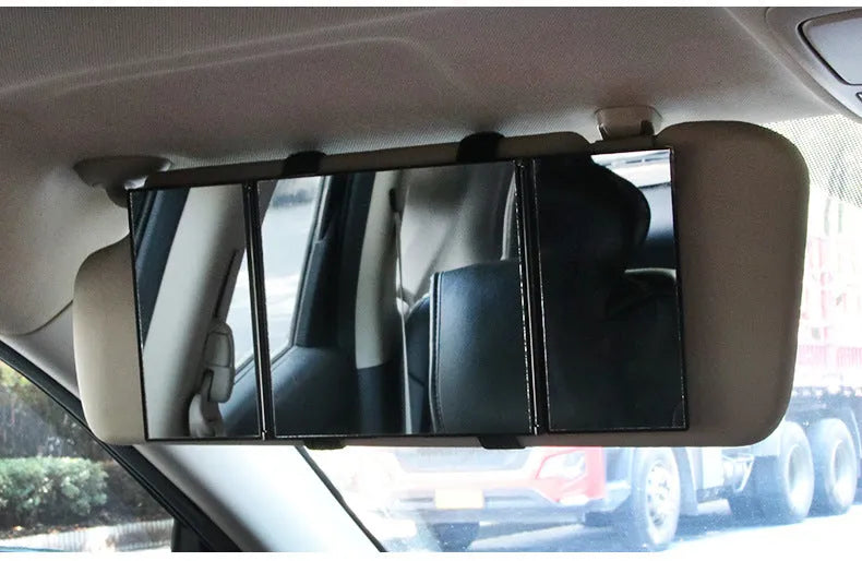 Silver folding car visor makeup mirror shown open and closed