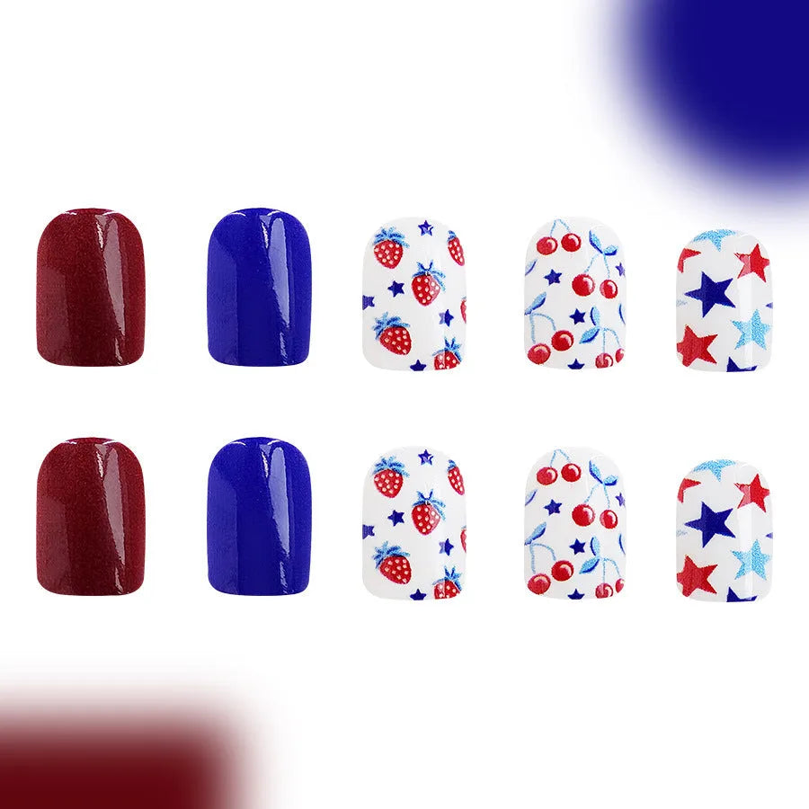 Short glossy red and blue nail stickers with strawberry and cherry pattern, 24 pieces.