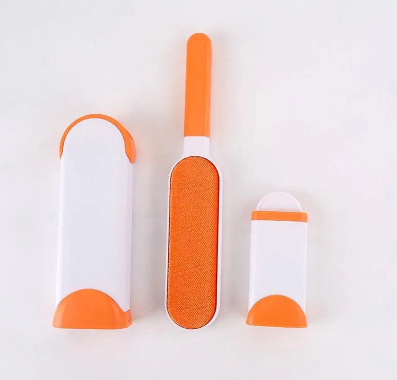Reusable pet hair removal brush with double-sided roller and self-cleaning base