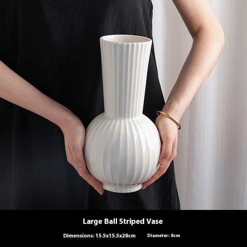 White ball-shaped ceramic vase with stripes, an American country style living room table decoration.