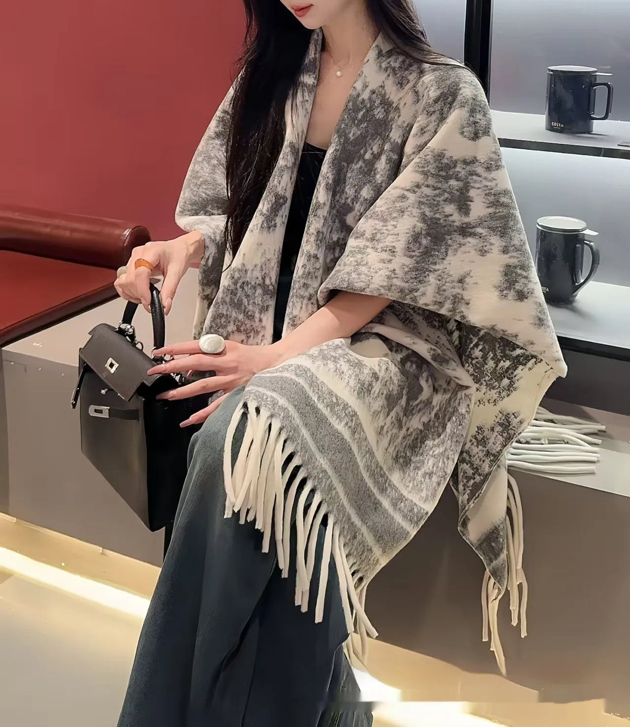 Women's polyester scarf cape with tassel trim in multiple colour options