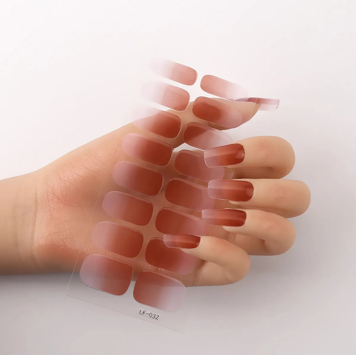 Full nail art sticker sheet showing 16 different solid colour designs including European simple nails and floral patterns