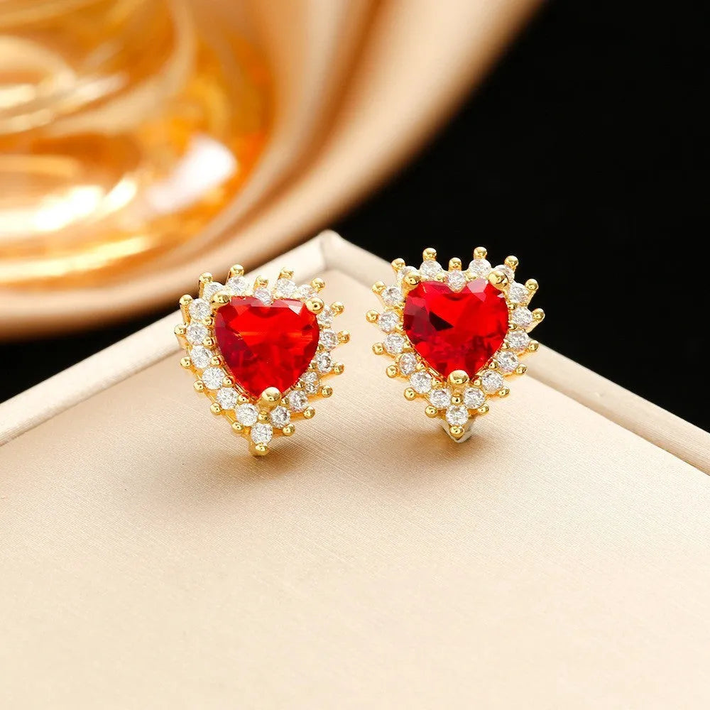Gold red titanium steel jewellery set with hearts and flower pendant including necklace, ear studs, and ring