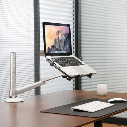 OA-1 aluminium alloy laptop stand with height adjustable arm and rotating platform on a desk
