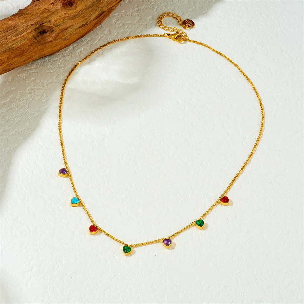 Women's gold-plated heart necklace on adjustable stainless steel chain showing love design element