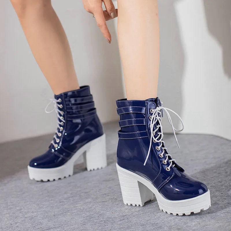 Women's black ankle boots with 6-8cm block heel, round toe, and lace-up front