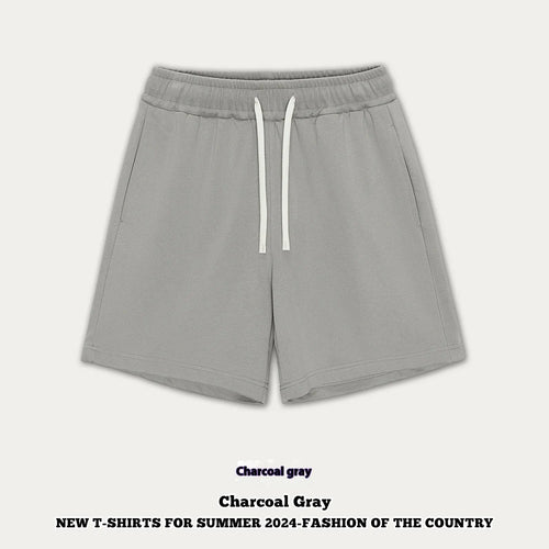 Casual cotton denim shorts for a baby boy or girl in a loose fit, shown in khaki colour.