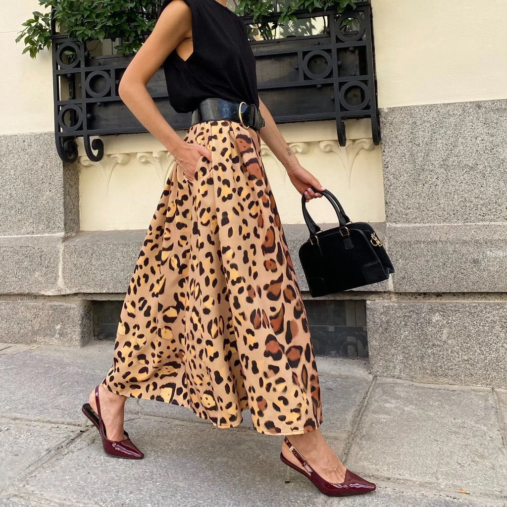 Brown leopard print women's A-line skirt with long length and big hem in polyester fabric