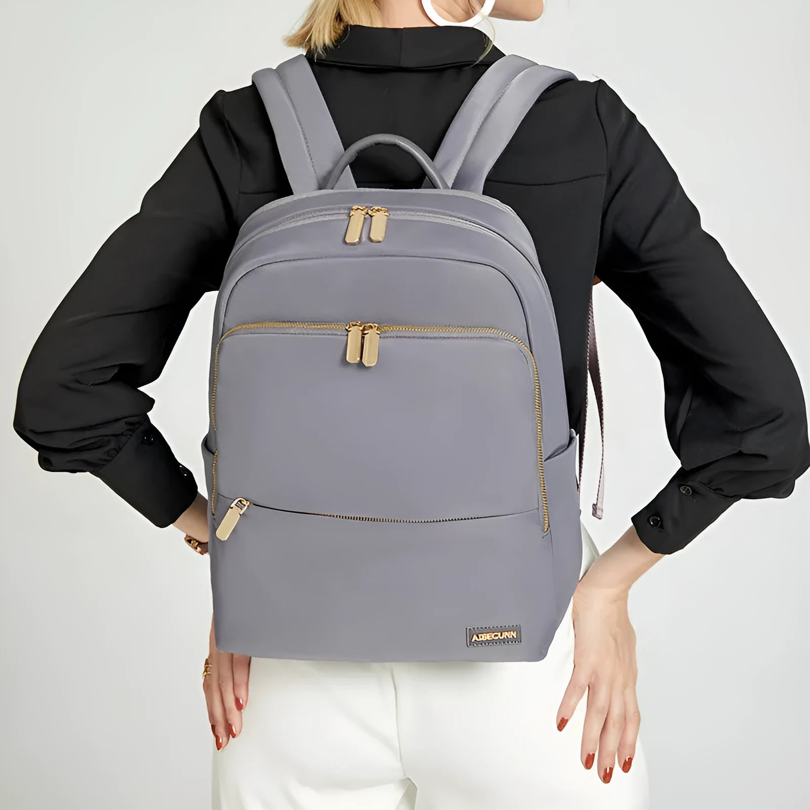 Oxford cloth women's backpack in black or purplish grey with large capacity and anti-theft features