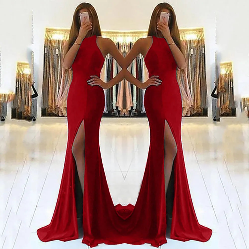 Long red evening dress with hollow pattern design, high waist, and large swing skirt