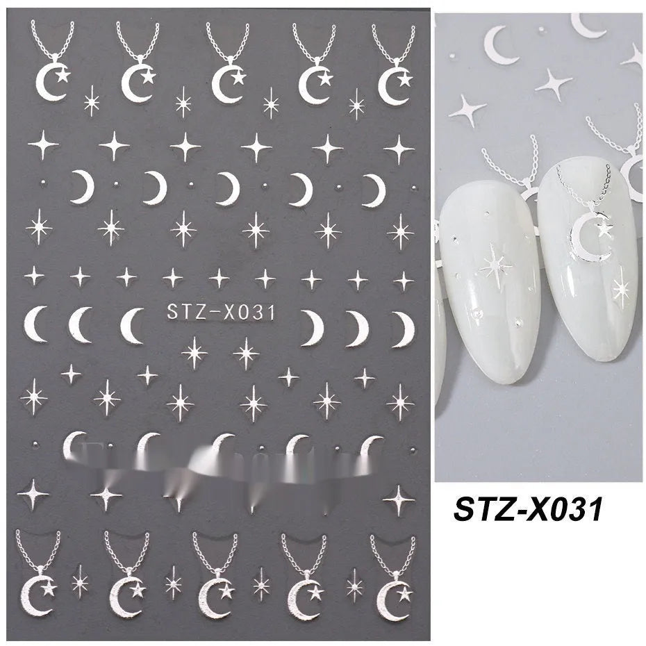 Plastic sheet of black, silver, and cartoon design nail art stickers for DIY manicures.