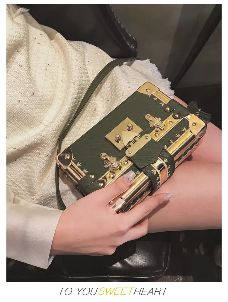 Hard-case women's shoulder bag with flap design, rivet decoration, and adjustable crossbody strap