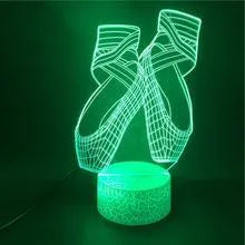 3D acrylic ballet shoe night light with colourful LED illumination on ABS base, remote control beside it