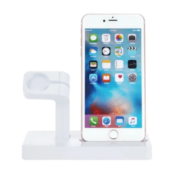 White 2-in-1 charging dock holding an iPhone and an Apple Watch on a wooden desk.