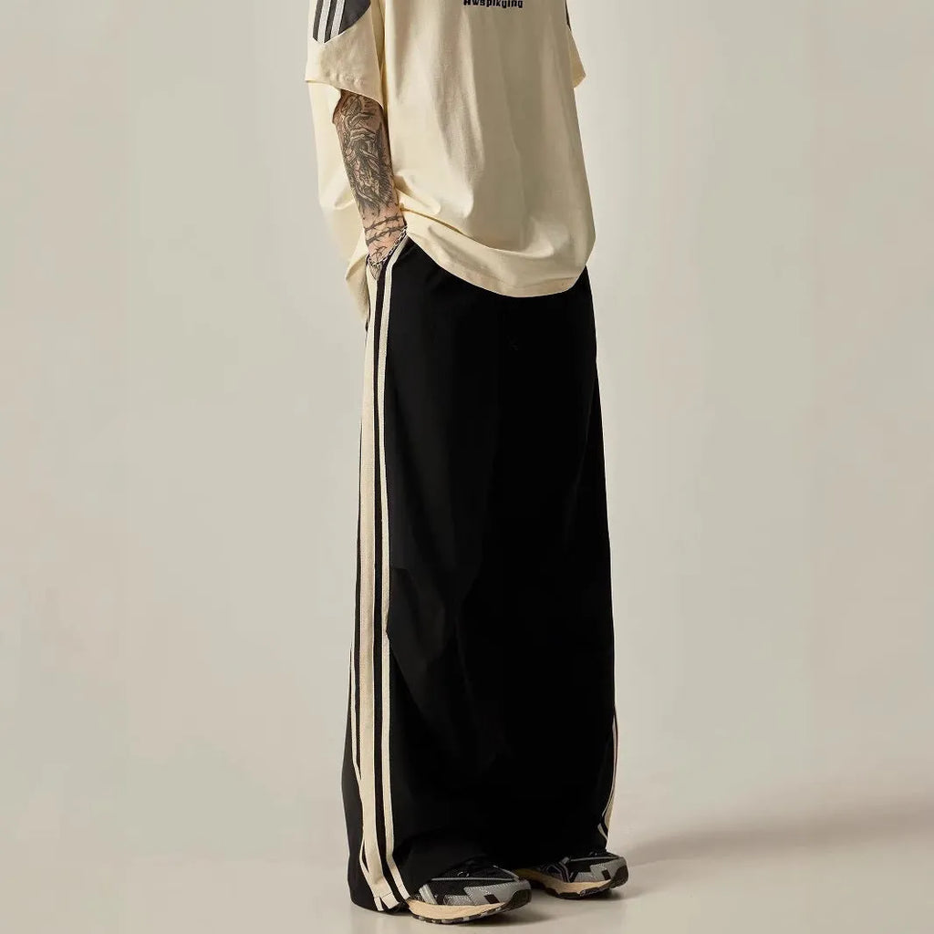 Black wide-leg climbing trousers with high waist design shown flat