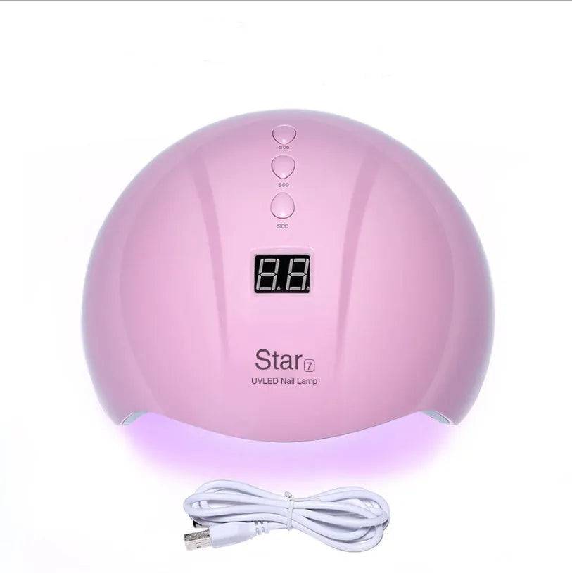 Set of polystyrene foam star cake toppers in gold, pink, red, and white colours in various sizes.