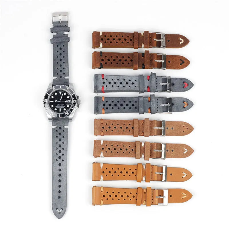 Handmade retro genuine leather watch band in brown with white stitching on a wooden surface