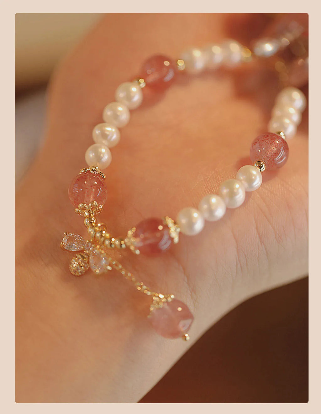 Strawberry quartz crystal bracelet with bow detail and stringed pearls for women