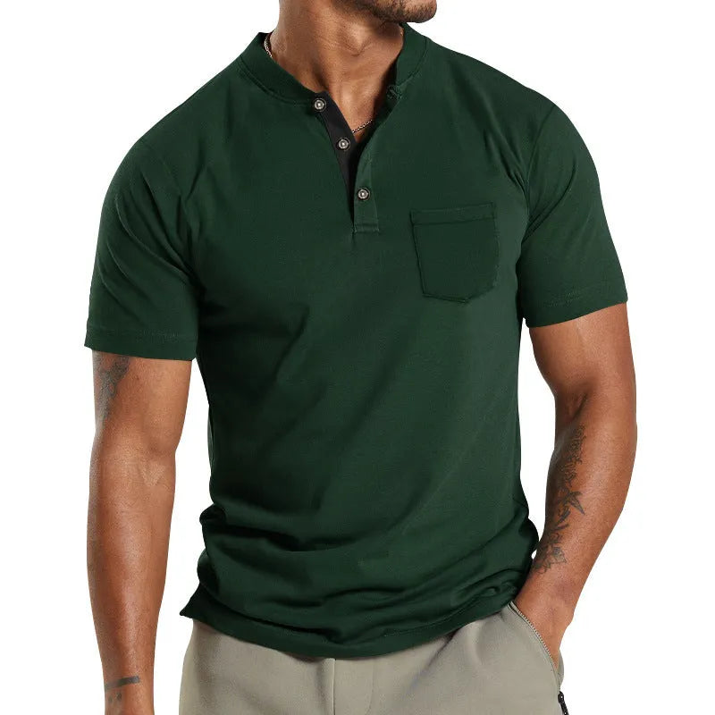 Plus size man wearing a light grey short sleeve casual shirt with a button chest pocket.