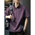 Brown men's half-zip stand collar short sleeve casual shirt laid flat, showing fleece lining and loose fit.