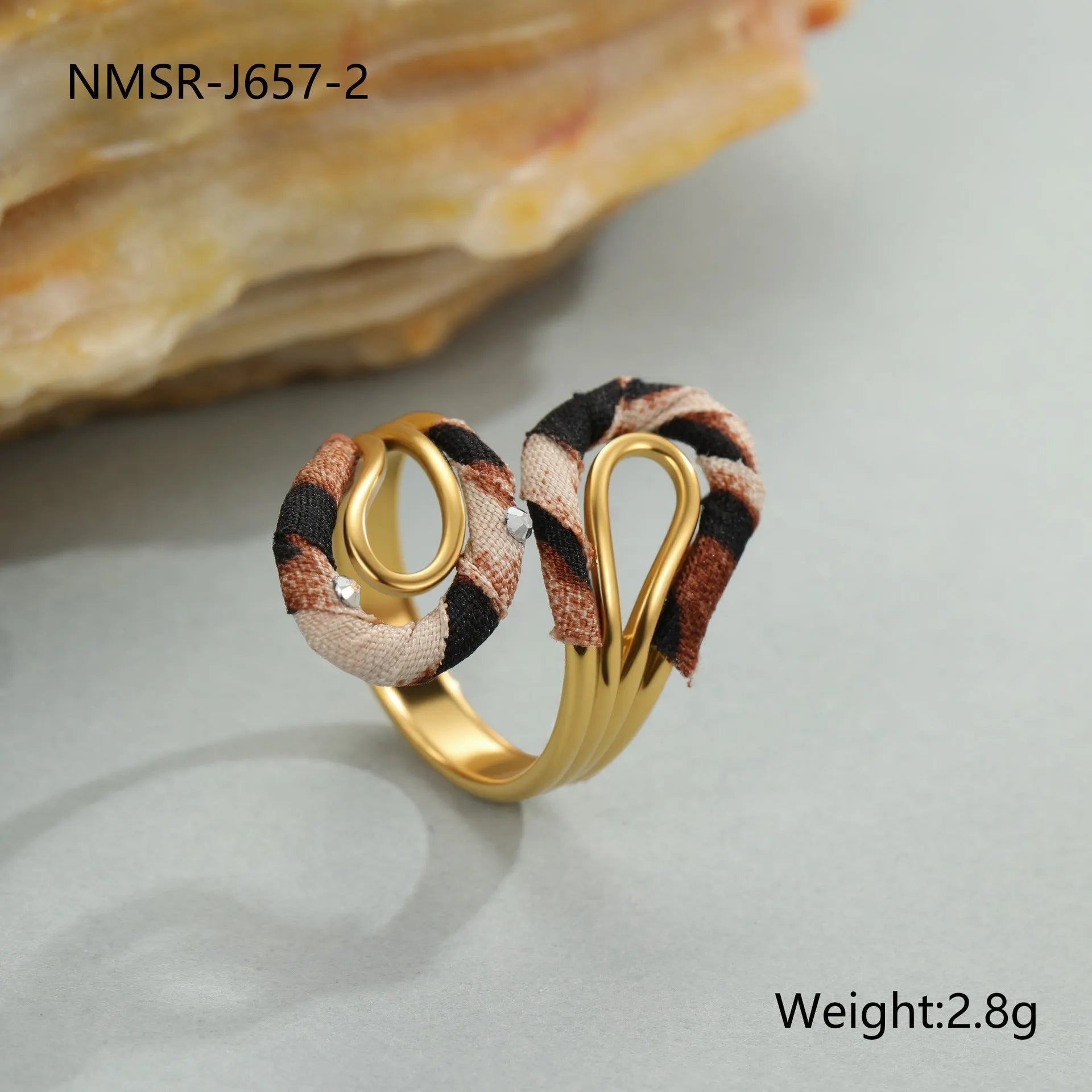 Stainless steel open mouth ring with leopard print and geometric designs including heart and star shapes