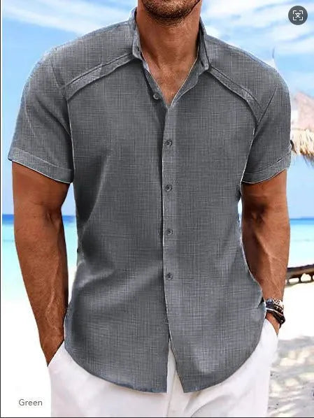 Hawaiian casual short sleeve solid colour shirt in a cotton blend fabric on a hanger.