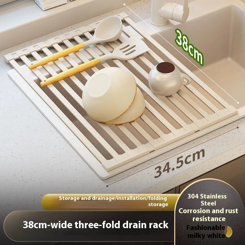 Milky white foldable stainless steel kitchen draining rack shown next to a sink.