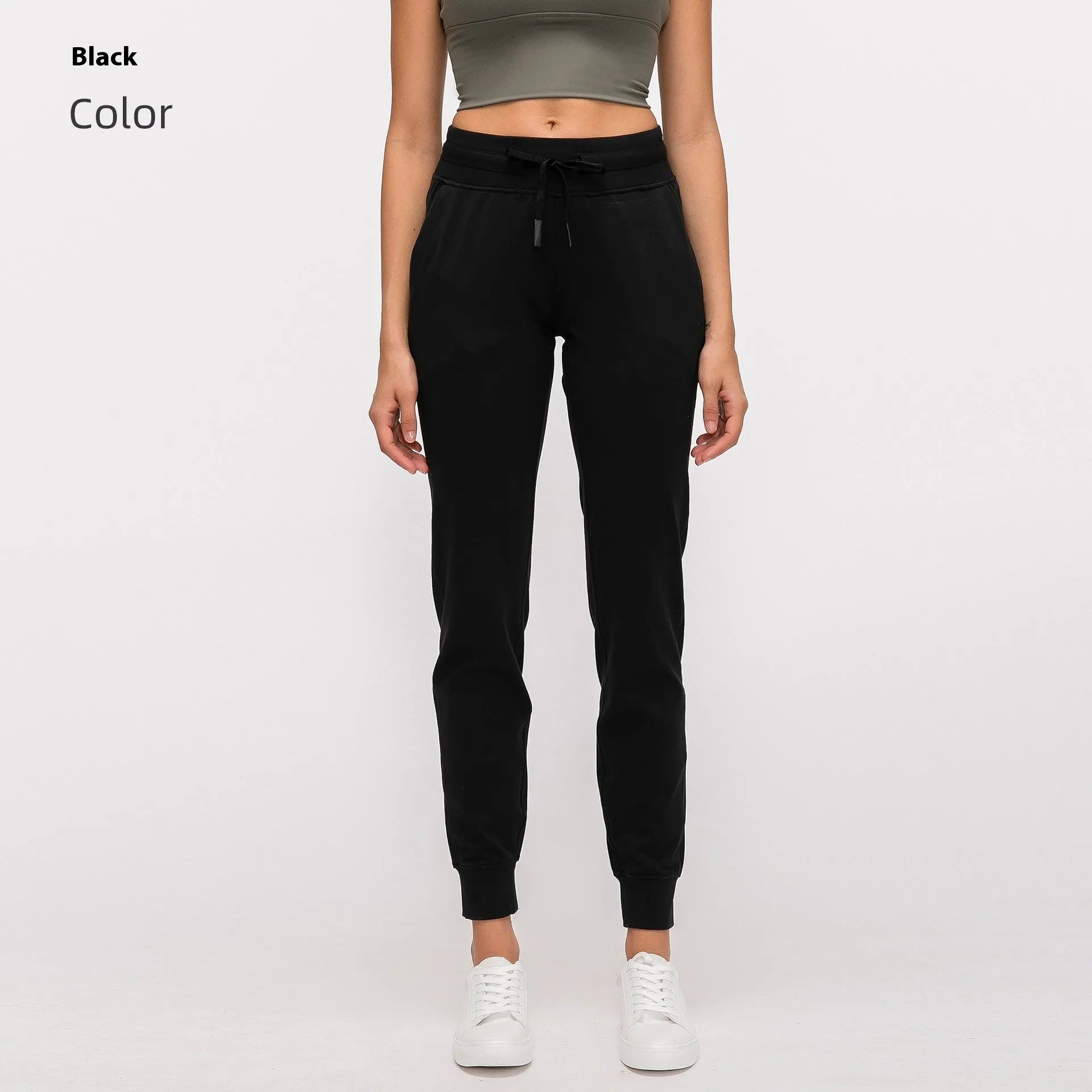 Women's high-waist yoga pants with drawstring waistband in distilled coffee colour, suitable for fitness.