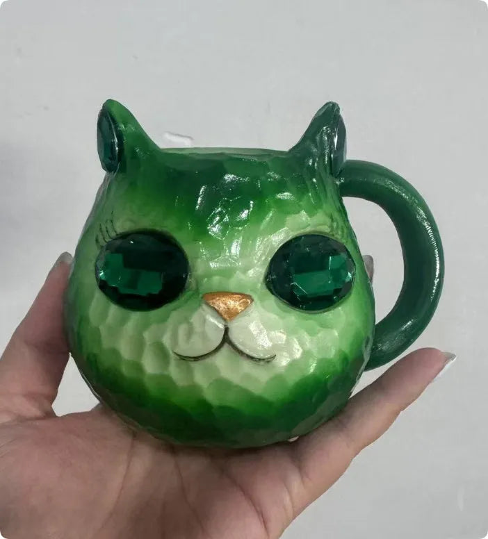 Crystal Earth Cat Cup resin craft decorative object in purple, green, blue, or pink colours.