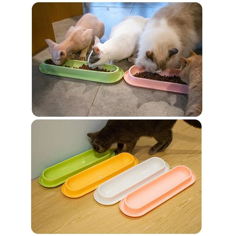 Set of four green pet feeding bowls with non-slip bases for cats and dogs