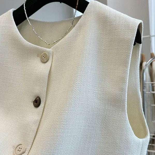Women's round neck sleeveless vest in French bandage style, available in milky white and black colours