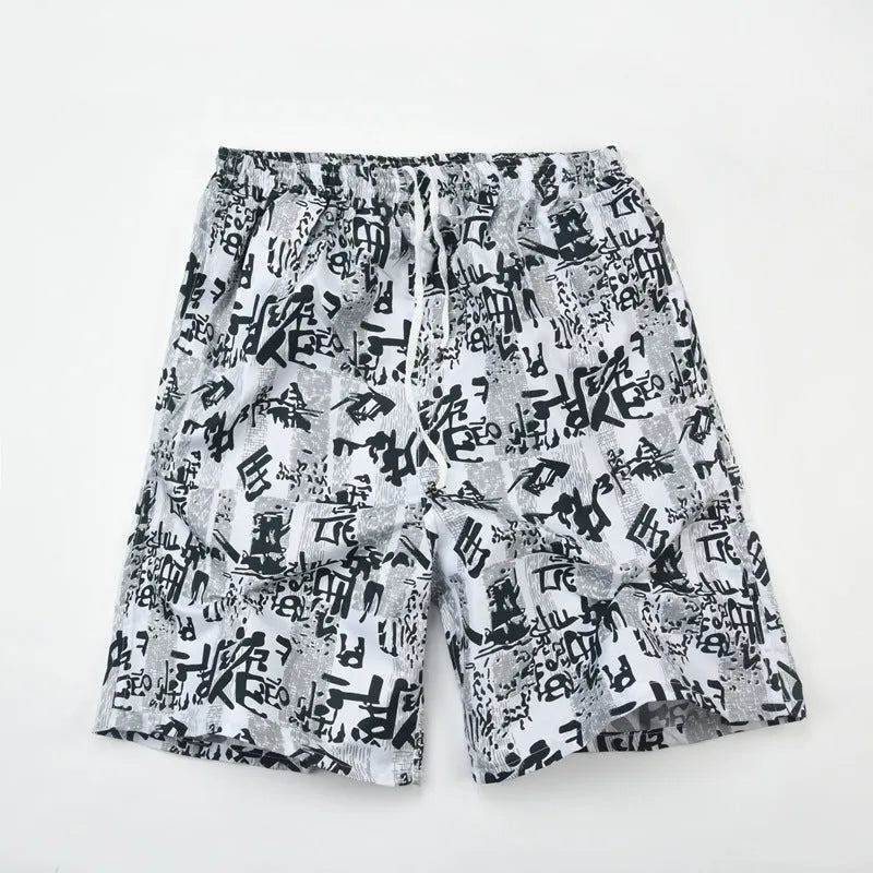 Men's floral print five-point swimming trunks made from polyester in a free size.