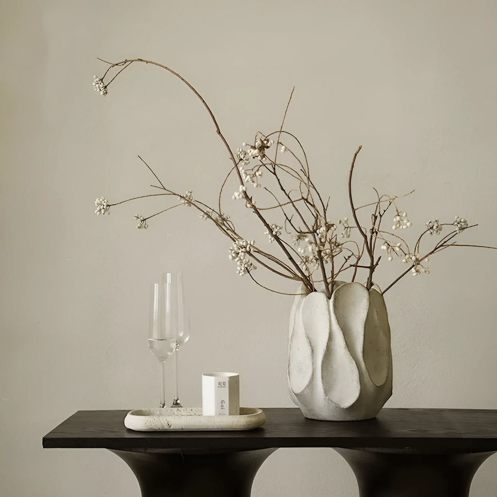 Irregular ceramic vase for flower arrangements in high style or low style profile