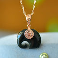 Flat natural Hetian Jade pendant with copper inlay design on a necklace chain
