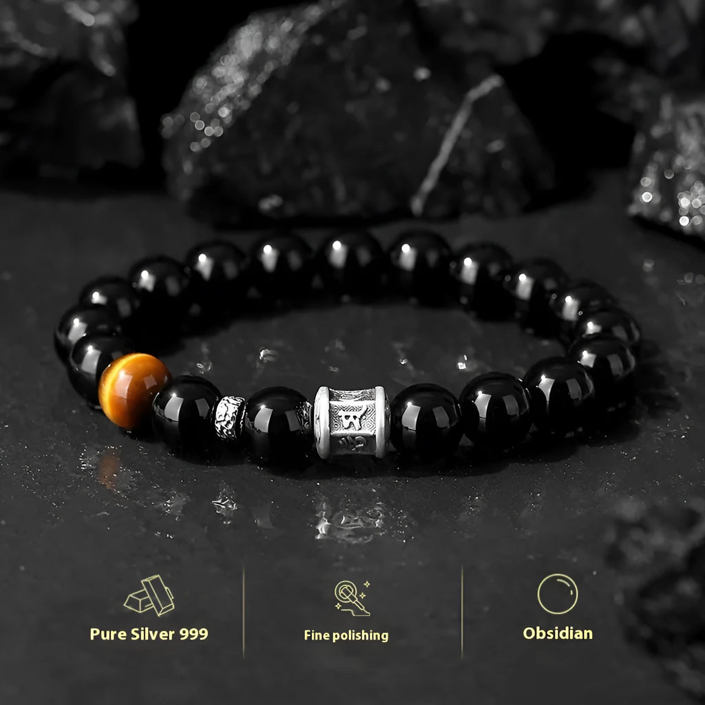 Men's obsidian and pure silver bracelet with a 10mm mantra prayer wheel bead.
