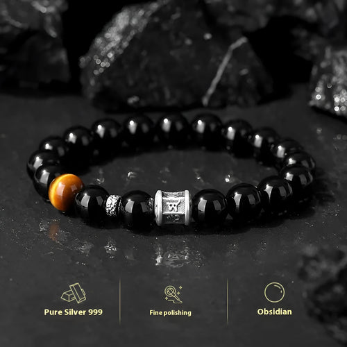 Men's obsidian and pure silver bracelet with a 10mm mantra prayer wheel bead.