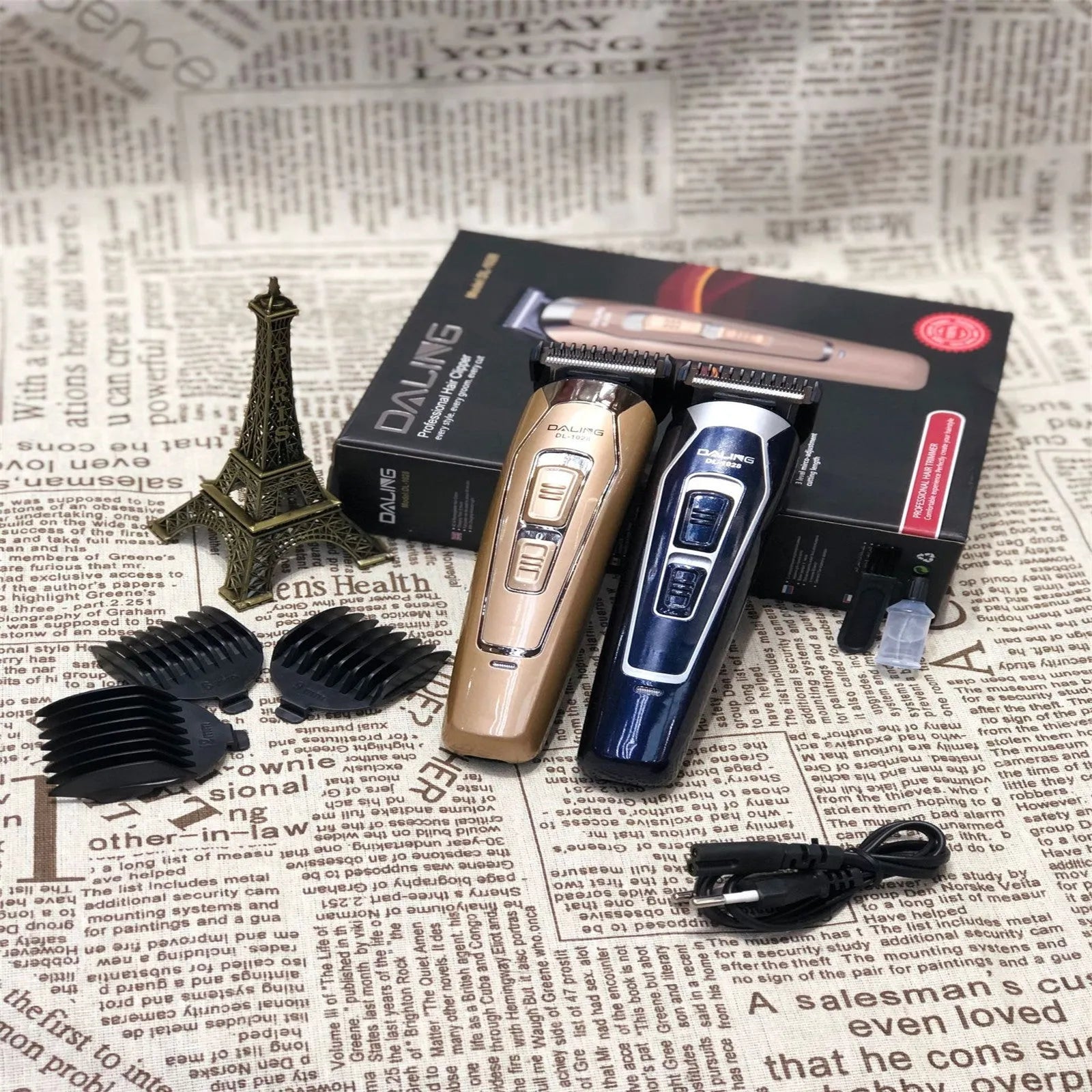 Dark blue and coffee coloured rechargeable electric hair clipper with USB charging cable.